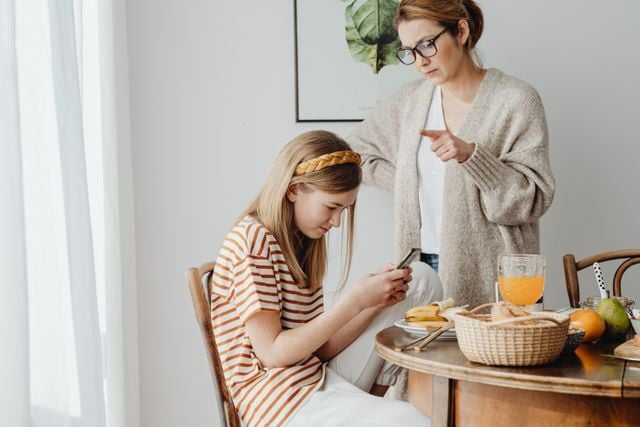 Teen Focused on Phone